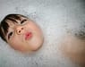 baby girl in tub